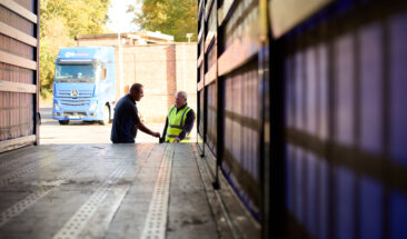 Driver checking truck