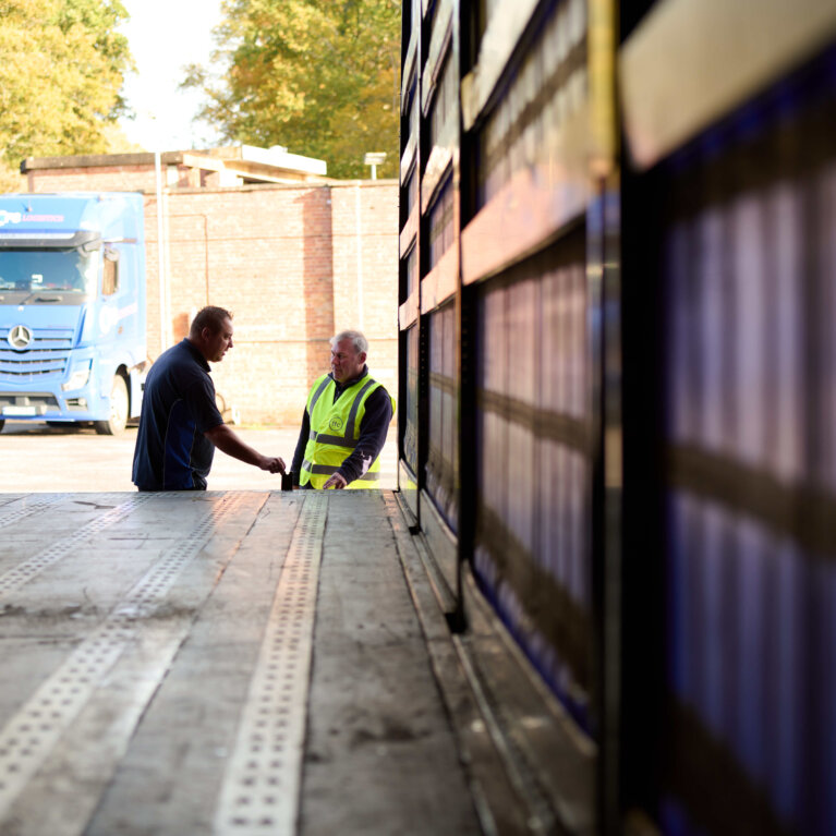 Driver checking truck