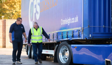 Driver checking truck