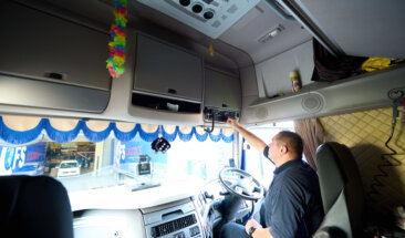 Driver checking truck