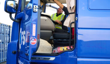 Driver checking truck