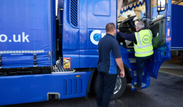 Driver checking truck