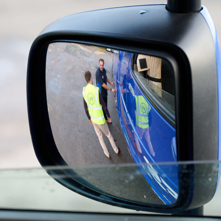 Driver checking truck