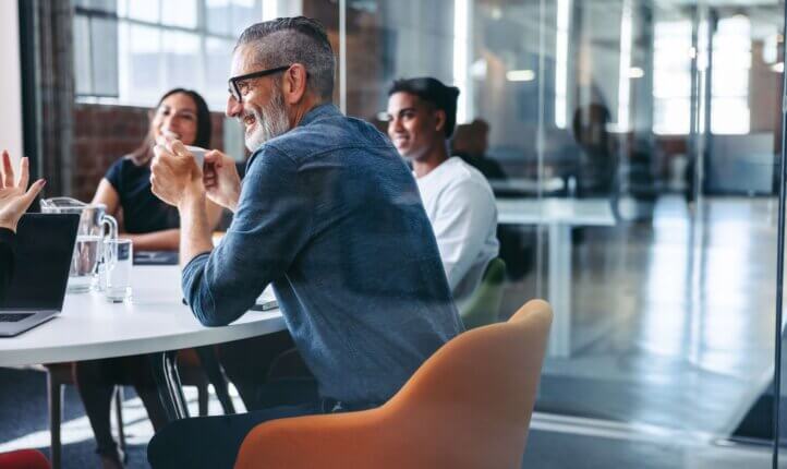 people discussing at table